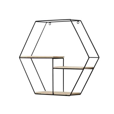 China Popular Space Saving Metal Wall Hanging Rack Decoration Multifunctional Display Storage Wall Mounted Shelf With Hexagon Floating Metal for sale