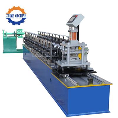 China Building Material Shops Roller Shutter Garage Door Roll Forming Machine Door Production Equipment for sale