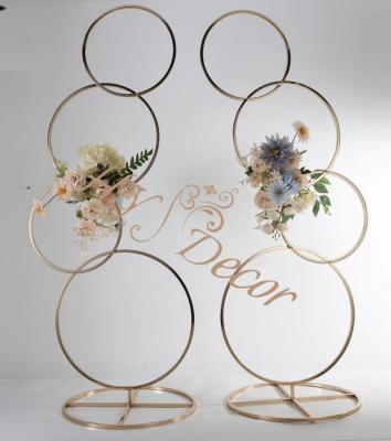 China Romantic Wedding Decoration HY Four Rings Tall Frame Metal Shinny Gold Arch Flower Backdrop Stand Event Decor Wedding Centerpiece for sale