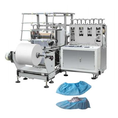 China Automatic Double Motor Disposable Nonwoven Plastic Shoe Jacket Cover Making Machine for sale