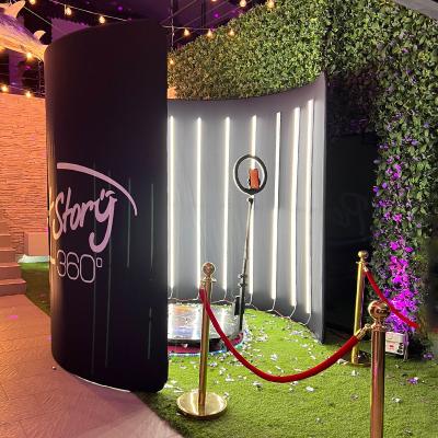 China Wedding Party Events and Meeting Supplies Portable Video Party Photobooth Lead Glass 360 Photos Auto Rotating Booth Machine Camera with Enclosure Backdrop for sale