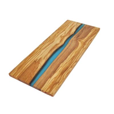 China Viable Design Trapezium Shape Natural Olive Wood Cheese Fruits Vegetables Color Custom Epoxy Resin Cutting Serving Cutting Board for sale