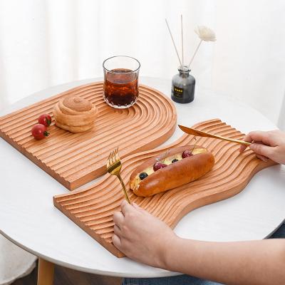 China Sustainable Handcrafted Wooden Black Walnut Beech Charcuterie Appetizer Table Fruit Vegetables Cutting Serving Board for sale