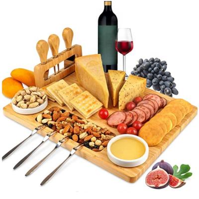 China Sustainable Wholesale Extra Large Cutting Charcuterie Knife Set Bamboo Cheese Board With Hidden Slide Drawers for sale