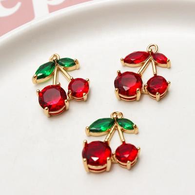 China Shiny Rhinestone Cherry Dangle Nail Charms Jewelry Gold Plating Metal Decoration Oosi De Classy Zircon Festival Holiday Finger For Nail Art Decorations for sale