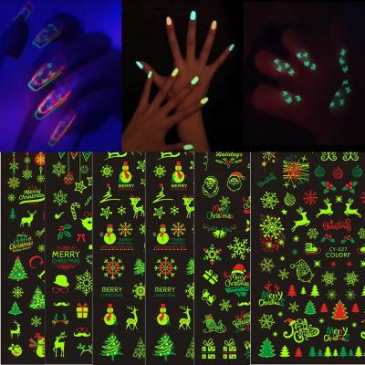 China Luminous Nail Art Oosi De 3D Adhesive Christmas Glitter Glow Sticker Festival Holiday Finger Decoration for Professional Nail Art Products for sale