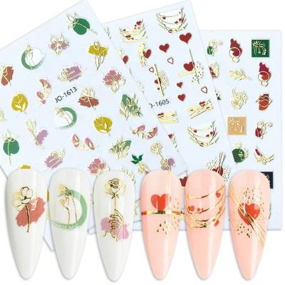 China Shiny Creative Nail Art Decoration Oosi Beautiful Flowers Spring Design Green Foil Gold Foil Design Stickers Festival Holiday Finger For Nail Accessories for sale