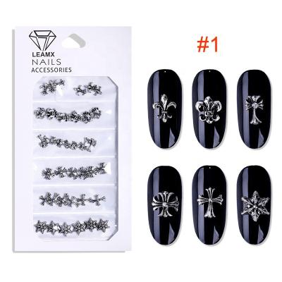 China Festival Holiday Finger Vintage Metal Decoration Oosi Nail Charms Hollow Out Mixed Cross Nail Art Decorations Supplies Set Ocean Style Alloy for sale