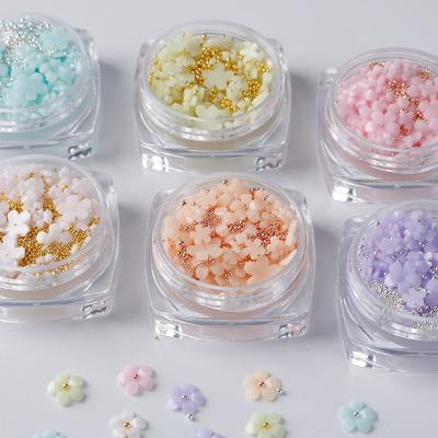 China Festival Holiday Manicure Mixed Finger Decoration Oosi Set Kawaii Resin Flowers 3D Nail Art Charms With DIY Decorative Stainless Steel Ball Beads for sale