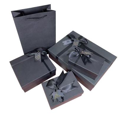 China Custom Recyclable Wholesale Luxury Black Cardboard Cosmetics Jewelry Gift Box Packaging Bag With Ribbon for sale