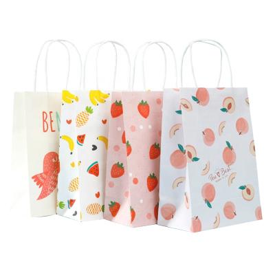 China Recyclable Boutique Cardboard Shopping Kids Cartoon Bags With Logo Printing Custom Eco Friendly Paper Bags for sale