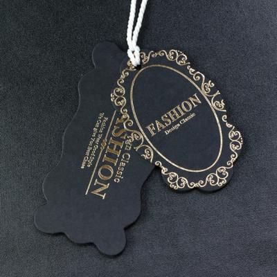 China Sustainable Personalized Black Paper Gold Foil Garment Hanger Tag for sale