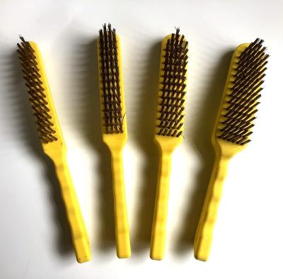 China Cleanging Handle Yellow Plastic Steel Wire Brush for sale