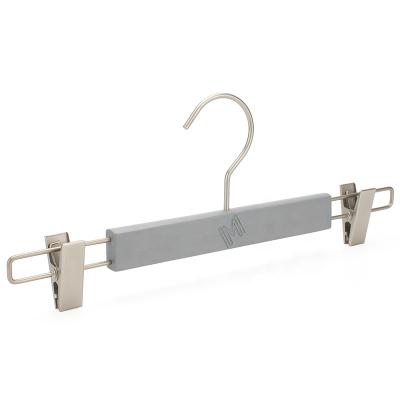 China Free Sample Clothing Store Wooden Hanger Gray Rubber Coating With Metal Clips For Jeans And Skirts for sale