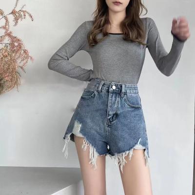 China Breathable 2022 New Arrivals Brocken Hole Women Denim Summer Shorts Fringed Denim Shorts Raw Ripped Jeans For Women for sale