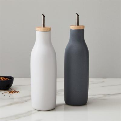 China Kitchen Restaurant Viable Hot Selling Cylinder Shape Matte Cooking Ceramic Bottles White Olive Oil And Vinegar Bottle Dispenser for sale