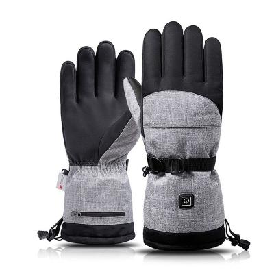 China Men Customized Winter Rechargeable Heated Ski Gloves Motorcycle Waterproof Battery Warm Gloves for sale