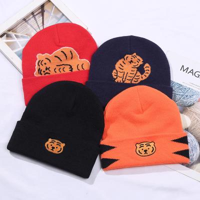 China COMMON Winter Kids Acrylic Knitted Beanie Hat Children Knit Tiger Pattern Beanie Hat Custom LOGO Woolen Cotton Ski Cap for sale