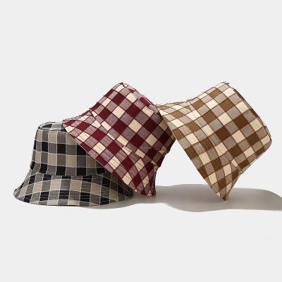 China Dobby Grid Pattern Mutil Color Bucket Hat Hip-hop Plaid Hat Hip-hop Flat Cap Fashion Design Fisherman Hat for sale