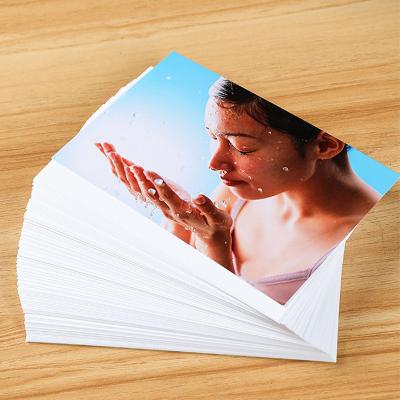 China Glossy Sticker Photo Paper 135gsm Glossy Paper Sticker Paper for sale