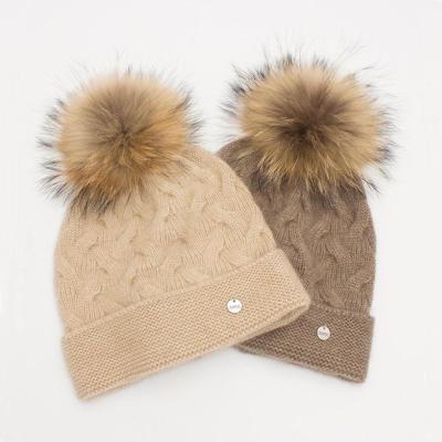 China Laides and Girls COMMON Thickness Winter Hat with Acrylic Faux Fur Pompom Knitted Hat for sale