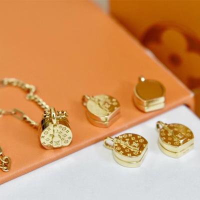 China High Quality Design Fashion 18K Gold Flower Bag Pendant High Quality Career Sense Of Real for sale