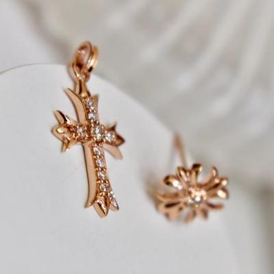 China Office / New Career Listing 18K Real Natural Diamond Gold Asymmetric Cross Stud Earrings for sale