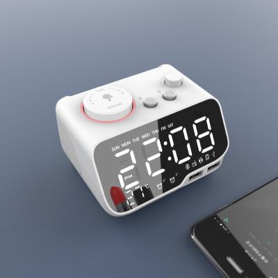 China Small sum to. Alarm Clock Wireless Speaker Radio LCD FM Music Player with Remote Controller 2 K7 USB Ports Calendar Week Day for sale