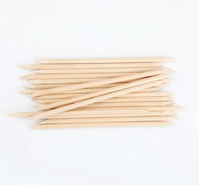 China Eco-friendly and non-toxic double ended orange wooden cuticle stick nail pusher 100pcs/bag for sale