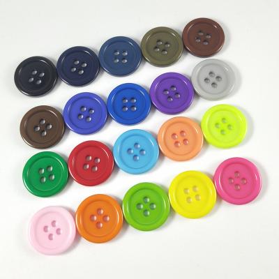 China Washable Hot Sale 4 Hole Amazon Jacket Logo Plastic Resin Flat Back Custom Engraved Casual Button for sale