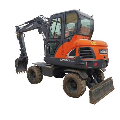 Китай 0.17м3 Подержанный экскаватор DOOSAN DX60W Энергосберегающий продается