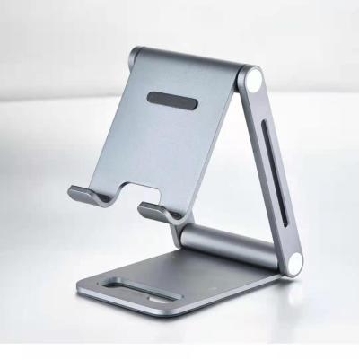 China 2021 Hot Adjustable Universal Aluminum Flexible Folding Mobile Phone Holder Smart Metal Tablet Stand Mobile Phone Holder for sale