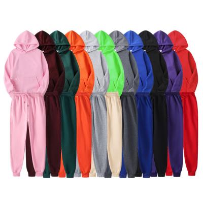 China Sustainable Hooded Brand White Gym Wear Hot Sale Design Running Jogging Tracksuit Men for sale