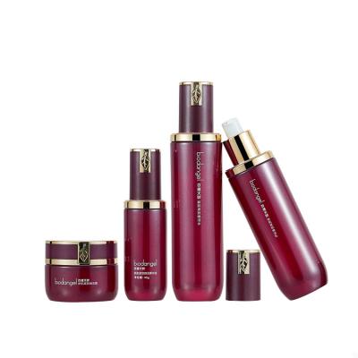 China Single Set 30ml 50ml Luxury Red Cream Glass Jar 40ml 50ml 100ml Packaging Personal Care Skin Care Serum Cream Pump Bottle High End for sale