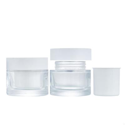 China 50ML 80ML Personal Care Skin Care Wholesale Clear Mouth Cosmetic Wide Mouth Glass Jar With Plastic Air Chamber for sale