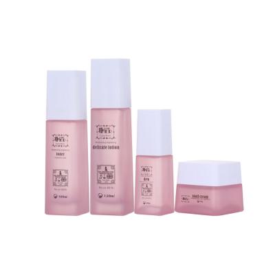 China Unique New Pink Color Cosmetics Packaging Set Glass Body Lotion Bottles Cream Jar With White Plastic Lids 40ML 50ML 100ML 120ML for sale