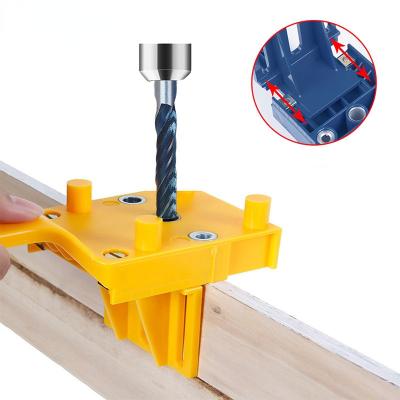 China Building Material Shops Quick Wood Carpenter Tool Handheld Drilling Doweling Kit Woodworking Hole Puncher Guide Drill 6/8/10mm Finger Jig Pocket Hole Jig for sale