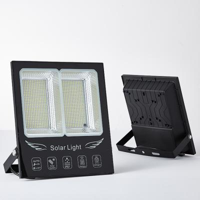 China Hotop garden lighting hot sale ip65 60w outdoor 100w 200w 300w new design led solar flood light for sale