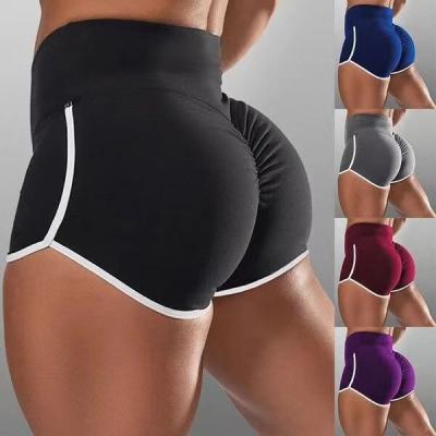 China Anti-Wrinkle Solid Color Sexy High Waist Sports Running Tight Hip Shorts for sale