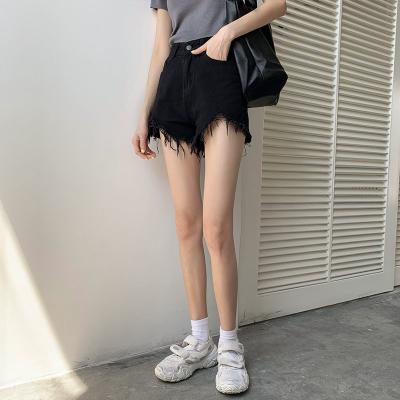 China Trend wide a-line loose warm pants leg high waist large size breathable raw edge denim casual ripped shorts women for sale