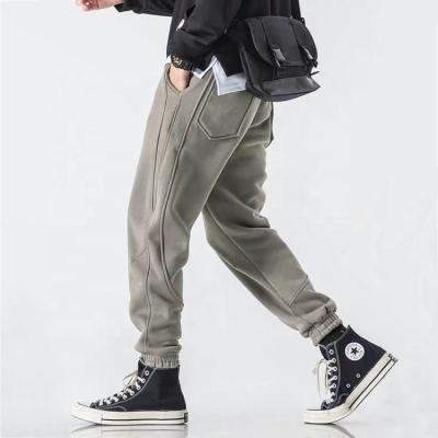 China QUICK DRY OEM Designs Streetwear Loungewear Sweatpants Winter Pants Works Trousers Men Casual Trousers for sale