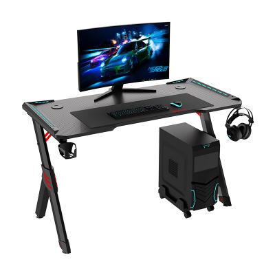 China 2021 Hot Sale Factory Direct Expandable RGB Game Table E-sport PC Desk Home Office Ministry of Interior with LED Light R-shape Gaming Desk for sale