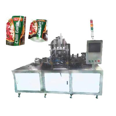 China Factory Leak Proof Liquid Spout Bag Clear Plastic Refill Doypack Bag Making Machine With Liquid Juice Packaging for sale