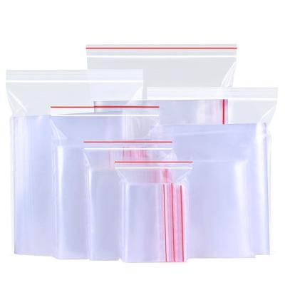 China Custom Recyclable Transparent Clear Printed Plain Zipper Bag Plastic Self Lock Bag With Red Side for sale