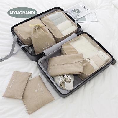 China Waterproof Customized Travel Bags Set Of 7 Packing Cubes With Storage Bag Drawstring Bag For Store for sale