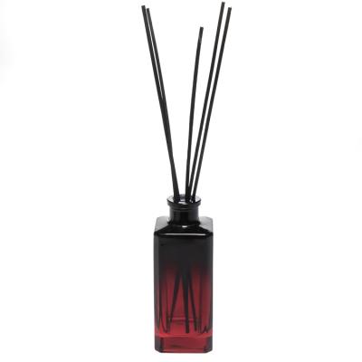 China Modern Flat Price 130ml Good Square Diffuser Oil Bottles Red Colored Glass Aroma Bottle With Sticks for sale