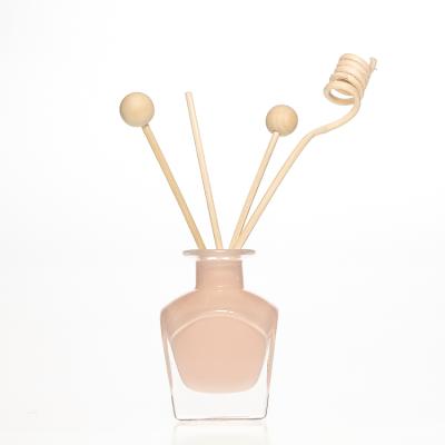 China Factory Sale Fancy Customize 50ml Square Pink Colored Luxury Diffuser Bottles With Rattan Sticks for sale