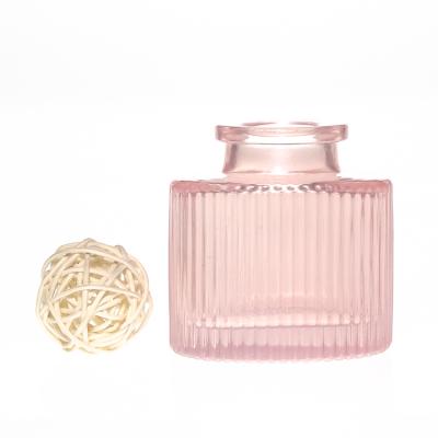 China Luxury Fast Delivery OEM Colored 30ml Engraving Pink Flower Glass Diffuser Bottles for sale