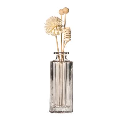 China Luxury Factory Outlet Embossed 150ml Cylindrical Shaped Wooden Reed Diffuser Glass Bottle With Ball for sale