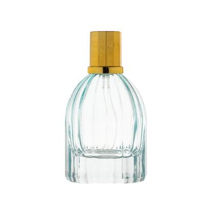 China Luxury Best Price Colored Empty Luxury Glass 50ml Blue Perfume Bottles With Sprayer for sale